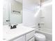 Bathroom featuring a bathtub-shower combo and a single sink vanity with storage at 211 Milky Way Dr, Apex, NC 27502