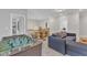 Entertainment area with a foosball table, lounge area, and overhead lighting at 2432 Spindle Ct, Raleigh, NC 27603