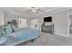Large main bedroom with plenty of closet space, neutral walls, plush carpet, and access to an en-suite bathroom at 2432 Spindle Ct, Raleigh, NC 27603