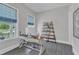 Bright office space with a large window, modern desk and stylish shelving at 2432 Spindle Ct, Raleigh, NC 27603
