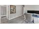 Spacious office area with a large desk and a bathroom across the room at 2432 Spindle Ct, Raleigh, NC 27603