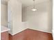 Dining room features a pendant light fixture and hardwood floors at 2604 Wyntercrest Ln, Durham, NC 27713