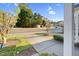 A clear street view showcases the house's position in a quiet neighborhood at 2604 Wyntercrest Ln, Durham, NC 27713