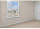 Cozy bedroom with a view of nature through a window at 270 Palm Dr, Sanford, NC 27330