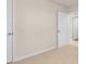 Bedroom featuring neutral colors and a bright white door at 270 Palm Dr, Sanford, NC 27330