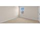 Neutral bedroom with carpet and plenty of natural light at 270 Palm Dr, Sanford, NC 27330