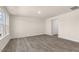 Bright living room features wood-look floors and a neutral color palette at 270 Palm Dr, Sanford, NC 27330