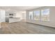 Large living room and kitchen, vinyl floors and stainless steel appliances at 270 Palm Dr, Sanford, NC 27330