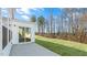 Outdoor patio with covered area and lush green lawn at 270 Palm Dr, Sanford, NC 27330