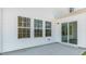 Outdoor patio with sliding glass door and windows at 270 Palm Dr, Sanford, NC 27330