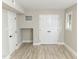 Spacious basement featuring modern wood-look vinyl flooring, crisp paint, and ample closet space and natural light at 2824 Wyncote Drive, Raleigh, NC 27603