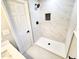 A fully renovated shower with a glass door and contemporary tiling, providing a stylish and modern bathroom experience at 2824 Wyncote Drive, Raleigh, NC 27603