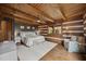 A serene main bedroom featuring a king bed, soft lighting, and a view of the trees at 2931 Western Hills Ln, Elon, NC 27244