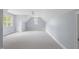 Spacious and bright bonus room with dormer windows and neutral carpet at 3016 Allansford Ln, Raleigh, NC 27613