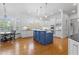 Gourmet kitchen with custom cabinets, a center island, stainless steel appliances, and a breakfast nook at 3016 Allansford Ln, Raleigh, NC 27613