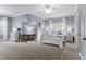 Spacious main bedroom with neutral colors, carpet floors, and plenty of natural light at 3016 Allansford Ln, Raleigh, NC 27613