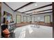 Bright office space with beautiful dark wood beams, trim, and five light-filled windows at 3016 Allansford Ln, Raleigh, NC 27613
