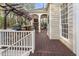 Multi-level outdoor space with a covered deck, outdoor kitchen, and a view of the backyard at 3016 Allansford Ln, Raleigh, NC 27613