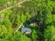 Overhead view of the home and fenced in backyard, including a shed and play set at 304 Westgate Cir, Angier, NC 27501
