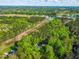 Expansive aerial view showcasing the home's secluded location with lush greenery and neighborhood amenities at 304 Westgate Cir, Angier, NC 27501