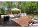 Spacious deck perfect for entertaining with outdoor seating and wooded view at 304 Westgate Cir, Angier, NC 27501