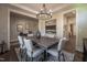 Spacious dining room features neutral walls, hardwood floors, modern chandelier, and modern decor at 306 White Magnolia Ln, Fuquay Varina, NC 27526