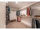 This walk-in closet has rods, shelves and a small bench for organizing all your clothes at 306 White Magnolia Ln, Fuquay Varina, NC 27526