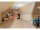 Spacious attic with neutral carpet and angled ceilings offers flexible space for storage or living at 310 Cedarhurst Ln, Franklinton, NC 27525