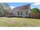 Home exterior with backyard, deck, and fencing, perfect for entertaining at 310 Cedarhurst Ln, Franklinton, NC 27525
