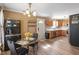 Charming dining room with a glass-top table, comfortable seating, and natural light, ideal for Gathering meals at 310 Cedarhurst Ln, Franklinton, NC 27525