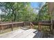 A wooden deck area perfect for entertaining or relaxing in the backyard at 310 Cedarhurst Ln, Franklinton, NC 27525