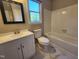 Bright bathroom featuring new tile flooring, a new vanity, and updated fixtures at 3109 Cinnamon Circle Cir, Raleigh, NC 27610