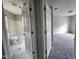 Features a neutral-colored bathroom and bedroom with new tile and carpeting at 3109 Cinnamon Circle Cir, Raleigh, NC 27610