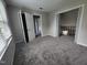 Bedroom with neutral walls, carpet, and interior doors at 3109 Cinnamon Circle Cir, Raleigh, NC 27610