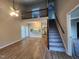 Spacious living room with vaulted ceiling, hardwood floors, and natural light at 3109 Cinnamon Circle Cir, Raleigh, NC 27610