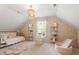 Charming bedroom featuring a whimsical decor, a cozy bed, open white shelving, and a play area with slide at 317 Okamato St, Raleigh, NC 27603