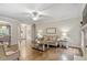 Spacious living area featuring hardwood floors, comfortable seating, and architectural details at 317 Okamato St, Raleigh, NC 27603