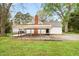 Backyard with fenced yard and covered parking at 323 Coral Ave, Goldston, NC 27252
