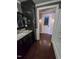A bathroom suite with granite countertops and dark wood cabinetry offering a modern touch at 323 Coral Ave, Goldston, NC 27252