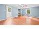Bright bedroom with hardwood floors, closet, sink, and lots of natural light at 323 Coral Ave, Goldston, NC 27252