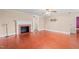 Living room featuring a fireplace and hardwood floors, perfect for cozy evenings at 323 Coral Ave, Goldston, NC 27252
