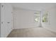 This neutrally designed bedroom is flooded with natural light and features carpeted floors and a closet at 3514 Shady Creek Dr, Durham, NC 27713