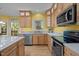 Well-equipped kitchen with stainless steel appliances and light wood cabinetry at 3514 Shady Creek Dr, Durham, NC 27713