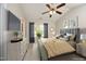 Stylishly furnished bedroom with carpet and ceiling fan plus outdoor views at 3623 Bison Hill Ln, Raleigh, NC 27604