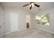 Well lit bedroom with neutral colors and carpet featuring an ensuite bathroom at 3623 Bison Hill Ln, Raleigh, NC 27604
