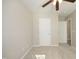 Bedroom showing carpet, ceiling fan, and doorways to a closet and another room at 3623 Bison Hill Ln, Raleigh, NC 27604