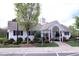 Exterior view of a white building with black shutters and well-maintained landscaping at 3623 Bison Hill Ln, Raleigh, NC 27604