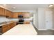 The kitchen features stainless appliances, and an island for ample counter space at 3623 Bison Hill Ln, Raleigh, NC 27604