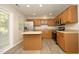 Functional kitchen with stainless steel appliances and wood cabinets at 3623 Bison Hill Ln, Raleigh, NC 27604