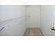 Walk-in closet showing carpet and a white wire rack shelf along the left side at 3623 Bison Hill Ln, Raleigh, NC 27604